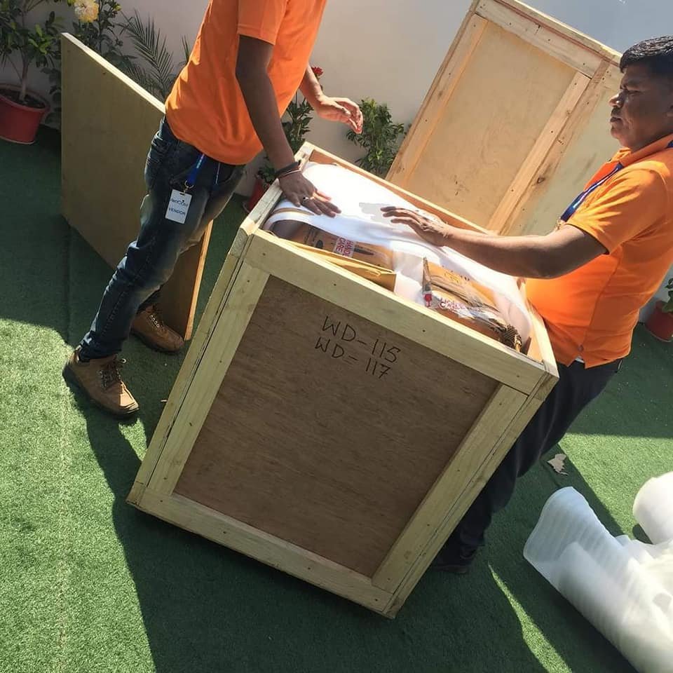 Maple Packers team managing relocation cargo